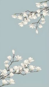 White floral branch wallpaper on a soft blue background