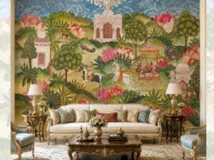 Luxury living room featuring a grand Indian heritage mural wallpaper with palace architecture, royal procession, blooming lotus flowers, peacocks, lush gardens, and scenic hills in a traditional hand-painted style