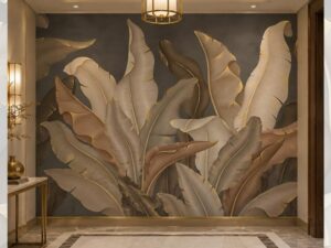 Contemporary tropical wallpaper mural featuring oversized banana leaves in warm beige, taupe, and bronze tones against a charcoal background.
