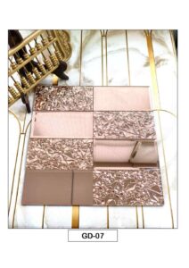 rose gold mosaic tiles with a combination of plain and textured reflective tile patterns.