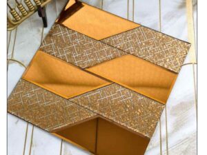 gold geometric decorative wall panel with textured pattern