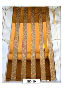 golden decorative fluted wall panel with textured geometric strips