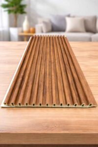 Wooden fluted wall panel with a warm natural wood finish displayed in a modern living room setting.